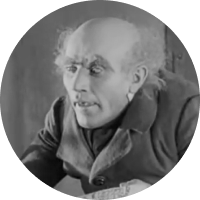 Александр Гранах в роли Кнок, риелтор